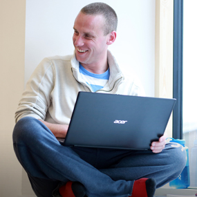 male using laptop