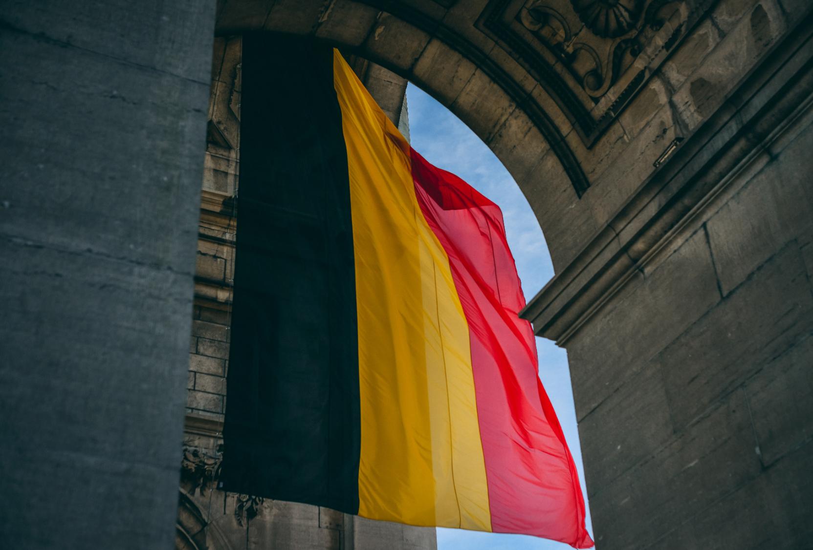 Belgium Flag under an arch.