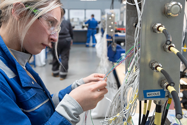 A BAE Systems employee looking focused